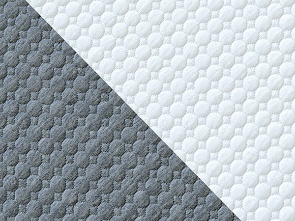 Materac z przekrojem pianki i tkaniny z podziałem na strefy
