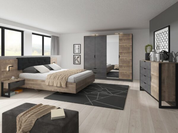 Aranżacja sypialni z łóżkiem i meblami w kolorze dąb i grafit