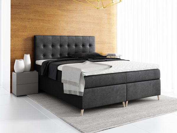 Grafitowe łóżko z niskim zagłówkiem i pionowymi przeszyciami