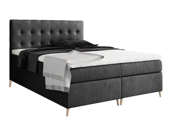 Ciemnoszare łóżko z gładką tapicerką i złotymi nogami