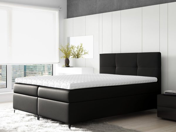 Kremowe łóżko z niskim zagłówkiem w nowoczesnej aranżacji sypialni