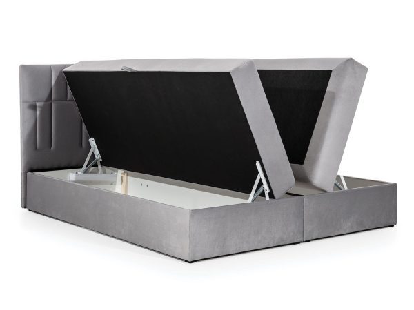 Jasnoszare łóżko kontynentalne z pionowymi przeszyciami i pojemnikiem