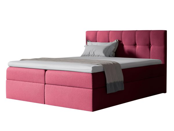 Różowe łóżko tapicerowane z podwójnym materacem i dekoracyjnym zagłówkiem