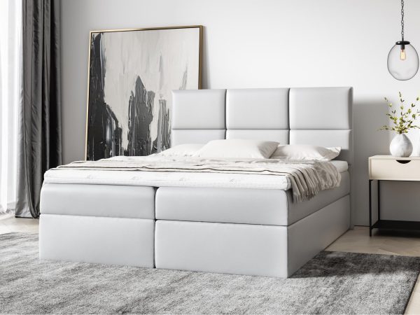 Jasnoszare łóżko z miękkim zagłówkiem do minimalistycznego wnętrza