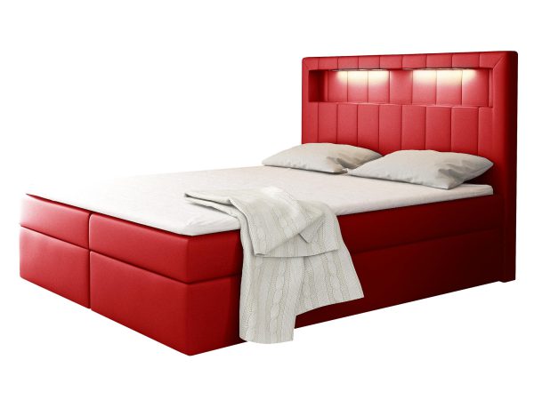 Aranżacja z czerwonym łóżkiem tapicerowanym i przeszyciami