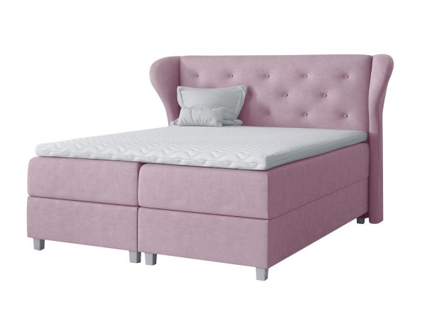 Pudroworóżowe łóżko z tapicerowanym zagłówkiem, styl kobiecy