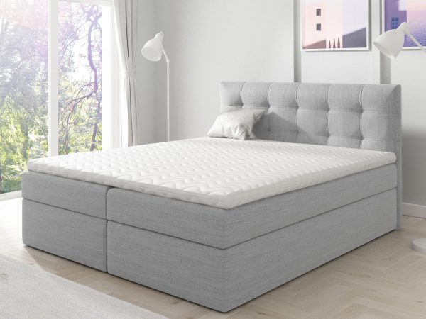 Jasnoszare łóżko z pikowaniem i prostą formą do stylowej sypialni