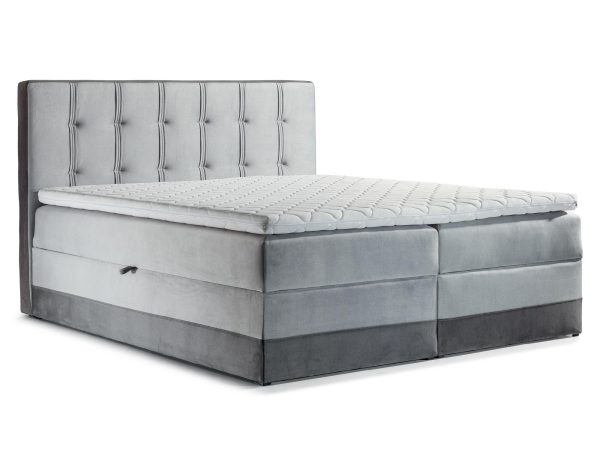 Jasnoszare łóżko z przeszyciami i pojemnikiem z boku