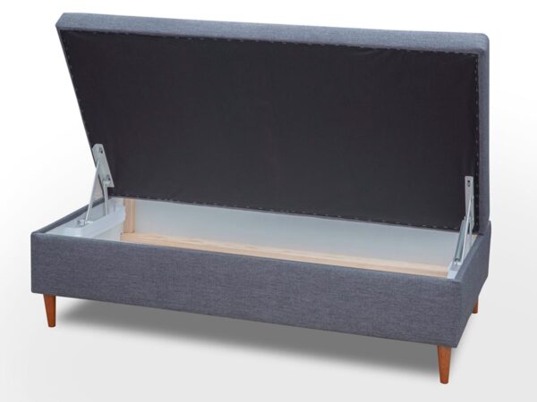 Szara pufa tapicerowana z otwieranym schowkiem