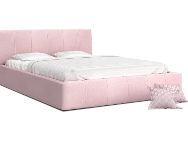 Jasnoróżowe łóżko tapicerowane do kobiecej sypialni