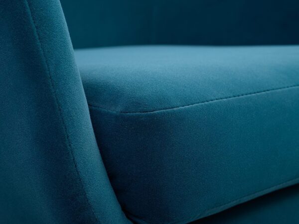 Zbliżenie tkaniny fotela w kolorze turkusowym – miękka struktura