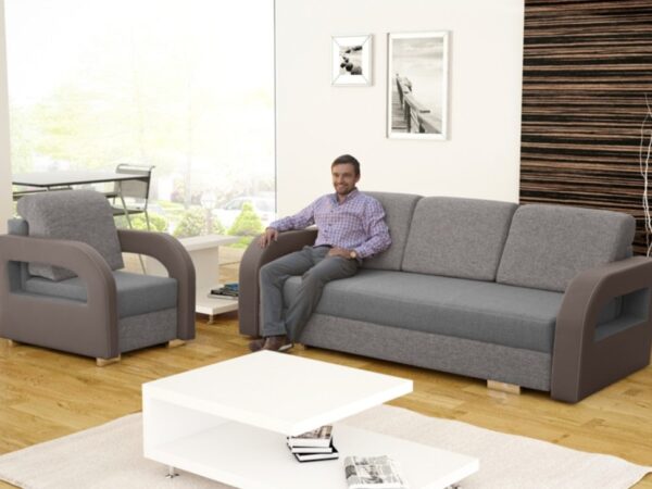 Fotel tapicerowany w odcieniu szarym w salonie z nowoczesnym stołem