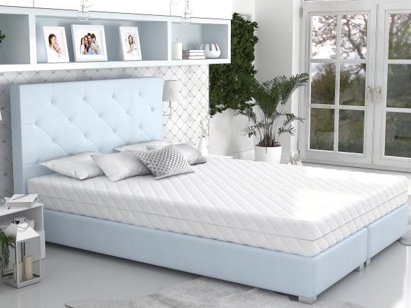 Błękitne łóżko tapicerowane z pikowanym zagłówkiem, styl elegancki