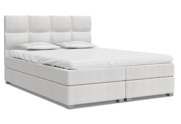 Białe łóżko kontynentalne z prostym zagłówkiem i pikowaniem