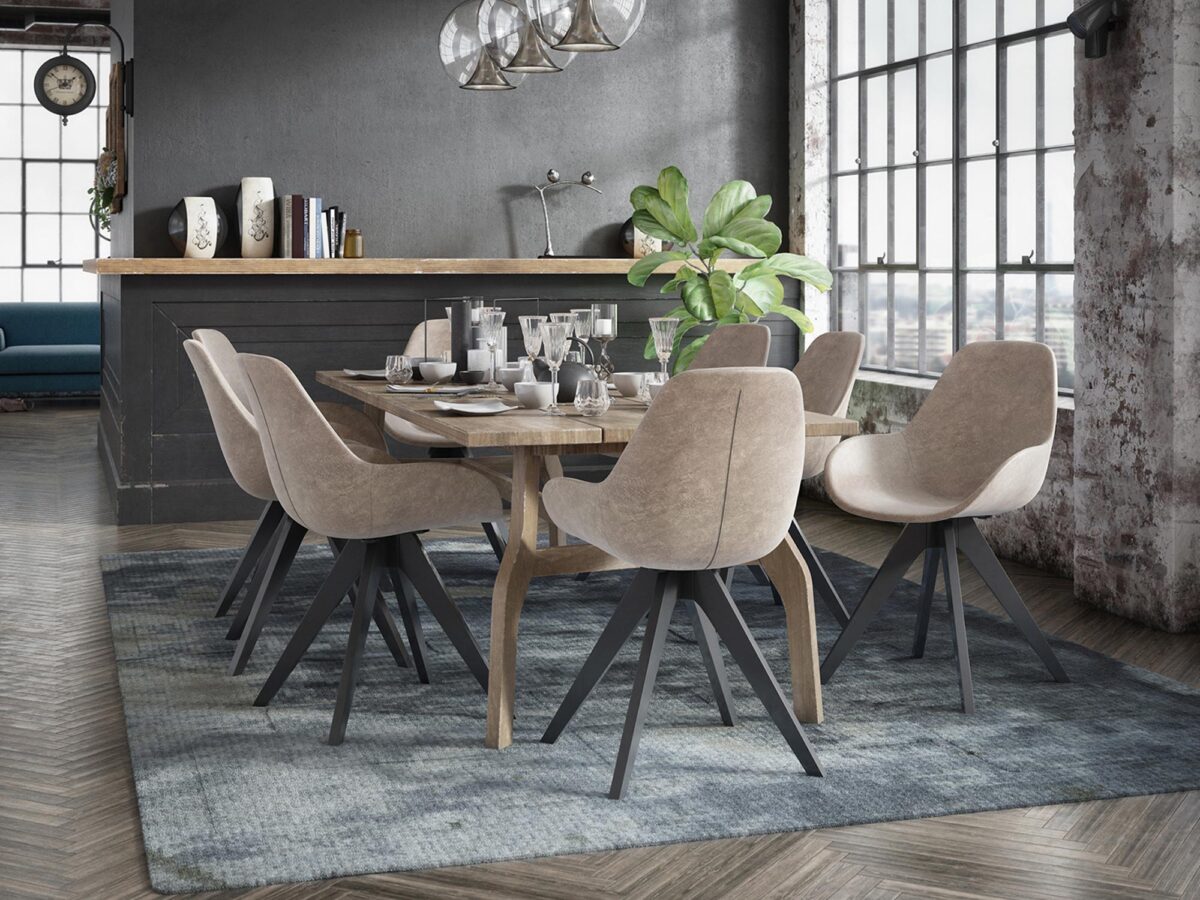 Industrialna jadalnia z ciemnym stołem i welurowymi krzesłami