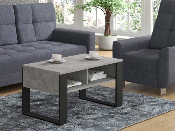 Aranżacja salonu ze stolikiem kawowym betonowym, czarne nogi