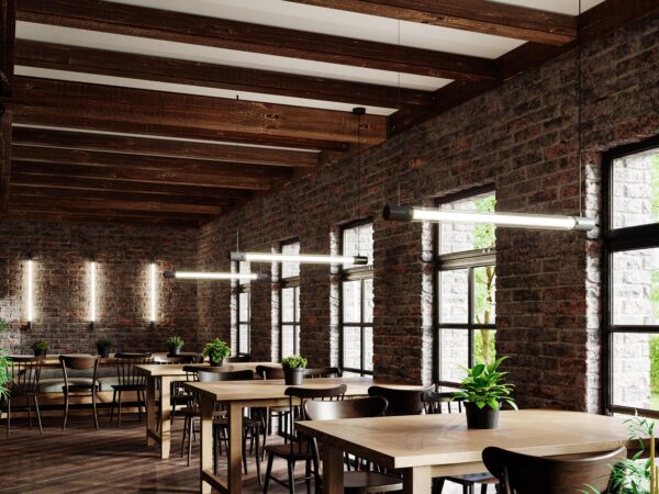 Widok jadalni w stylu industrialnym z pionowymi lampami LED