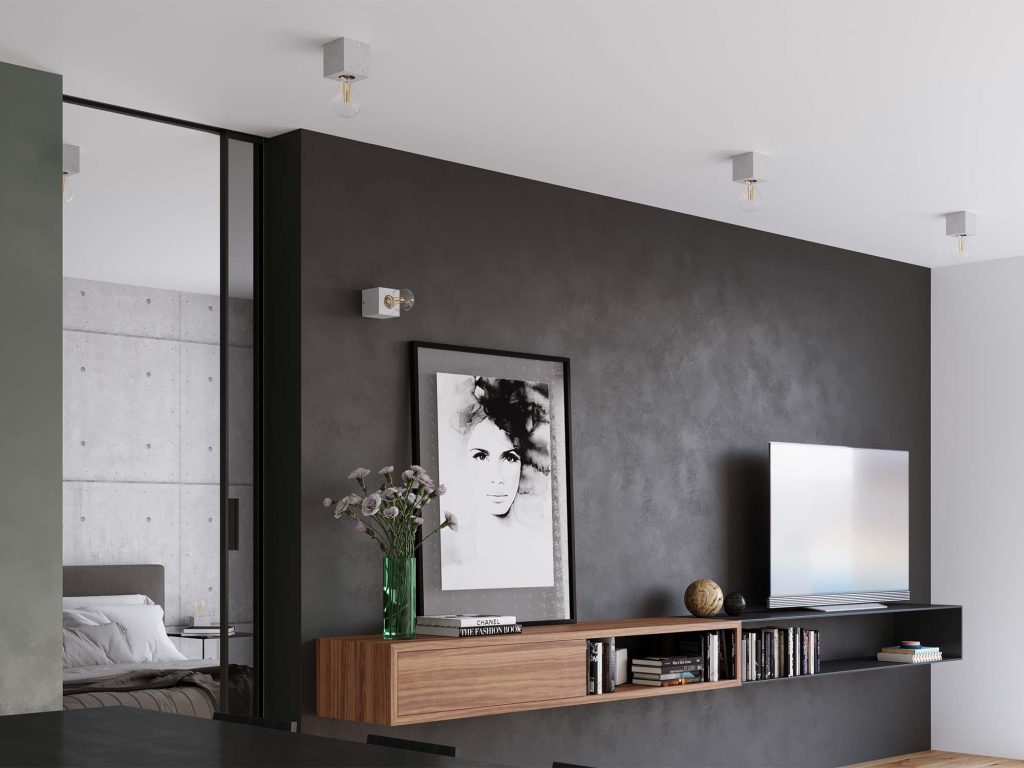 Salon w stylu industrialnym z czarną ścianą i nowoczesnymi kinkietami sufitowymi Salon w stylu industrialnym z czarną ścianą i nowoczesnymi kinkietami sufitowymi