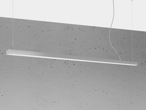 Lampa sufitowa LED o minimalistycznym designie nad betonową ścianą