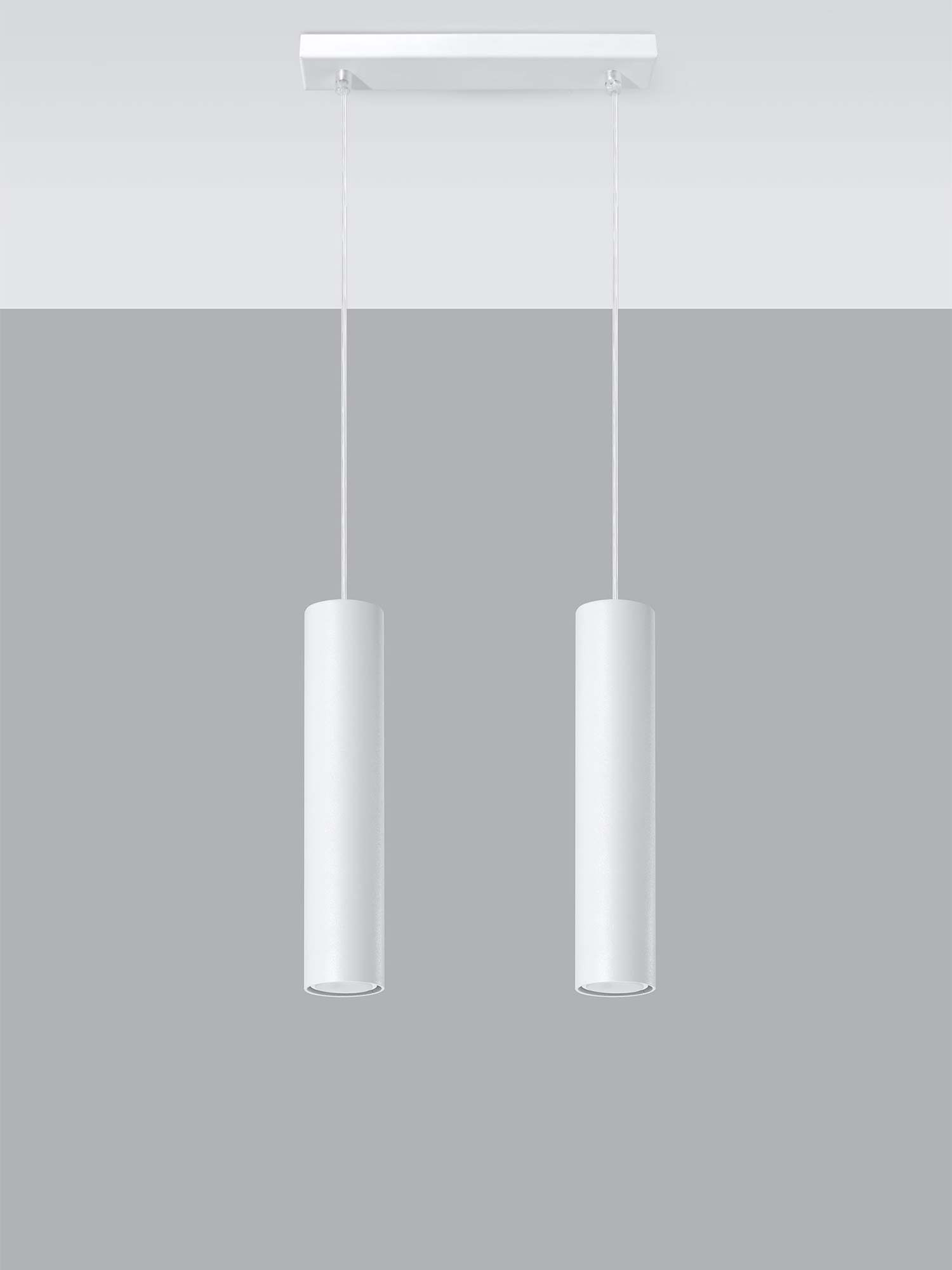 Industrialne oświetlenie nad stołem z geometrycznymi kloszami