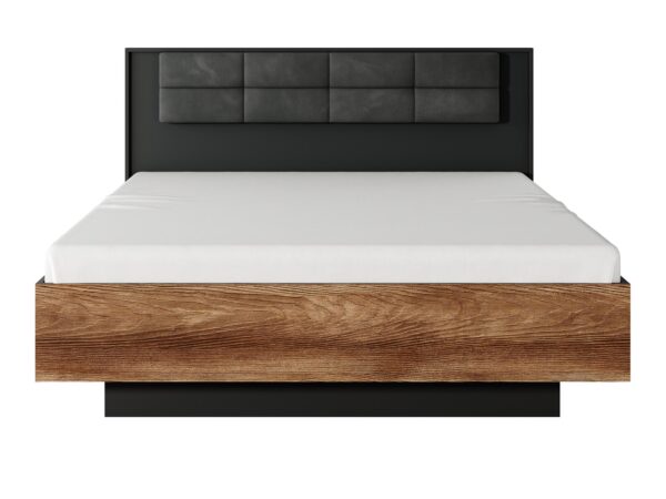 Widok boczny łóżka z czarnym zagłówkiem i ramą dębową – styl elegancki