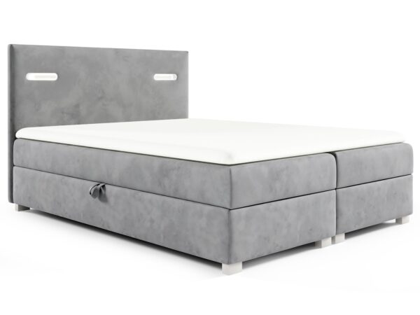 Szare łóżko z prostym podziałem i nowoczesną bryłą