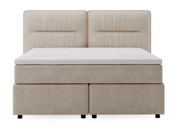 Beżowe łóżko kontynentalne z symetrycznymi pojemnikami na pościel