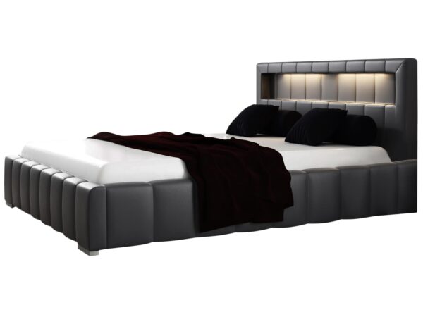 Czarno-białe łóżko z zagłówkiem w pasy i tapicerowaną podstawą, nowoczesny kontrast