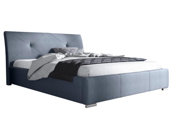 Granatowe łóżko z pikowanym zagłówkiem i niską podstawą