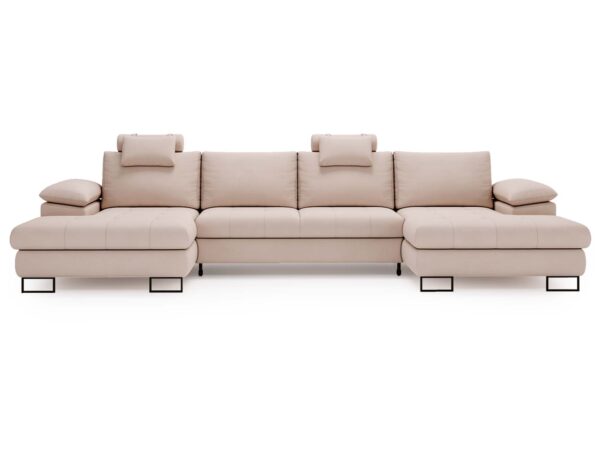 Kremowa sofa narożna z pikowanym siedziskiem i zagłówkiem