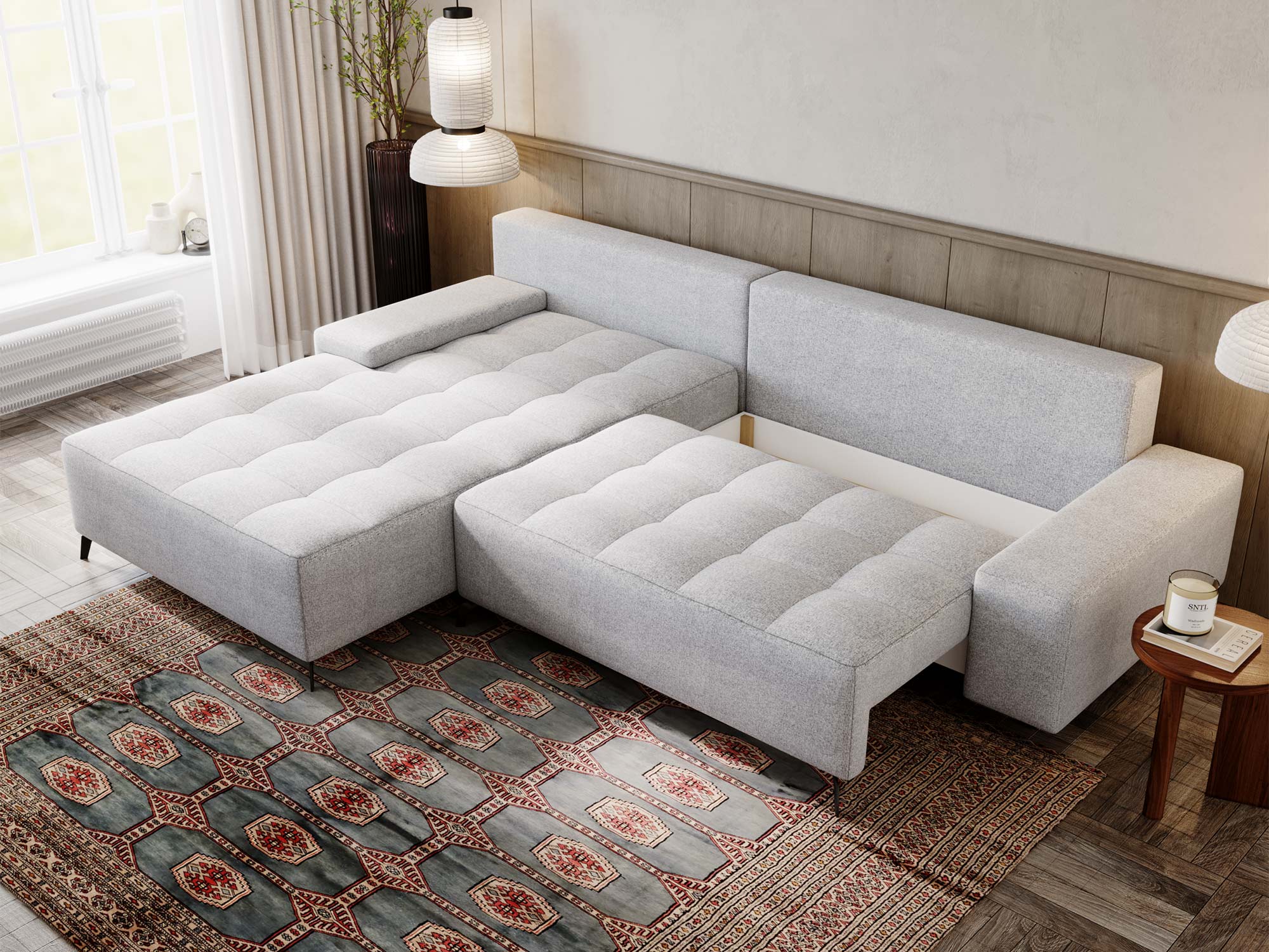 Jasnoszara sofa narożna z pikowanym siedziskiem w aranżacji salonu Jasnoszara sofa narożna z pikowanym siedziskiem w aranżacji salonu