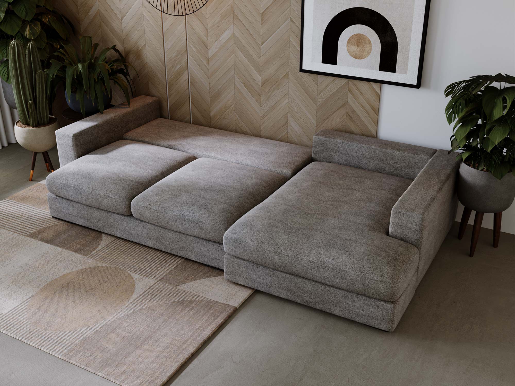 Beżowa sofa z funkcją spania w salonie z dekoracją ścienną