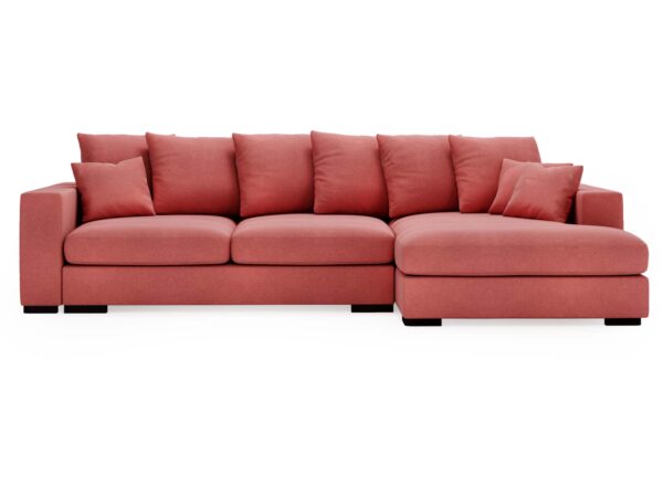 Czerwona sofa z grubymi poduchami i szezlongiem