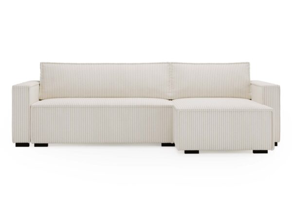 Narożnik sztruksowy kremowy z szerokim siedziskiem i pufą