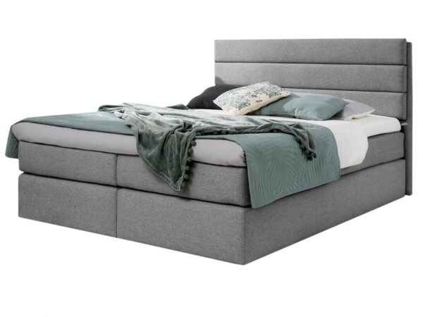 Szare łóżko z nowoczesnym wezgłowiem i niską podstawą w stylu minimalistycznym