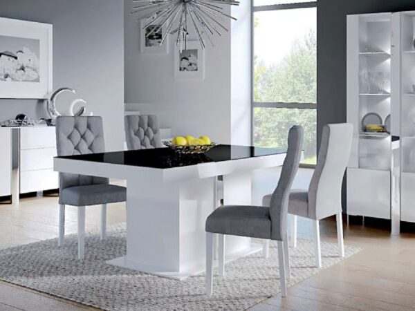 Nowoczesny stół biało-czarny z tapicerowanymi krzesłami w jadalni