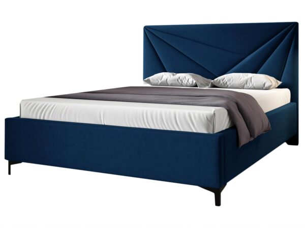 Granatowe łóżko z przeszyciami typu jodełka i wysoką podstawą