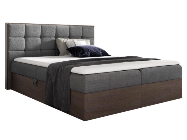 Jasnoszare łóżko z kontrastującym grafitowym kocem w przestronnej sypialni