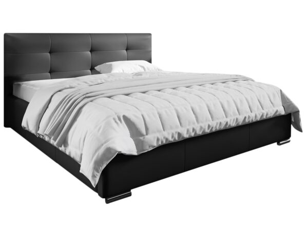 Łóżko z ciemnym zagłówkiem i białą pościelą – styl hotelowy