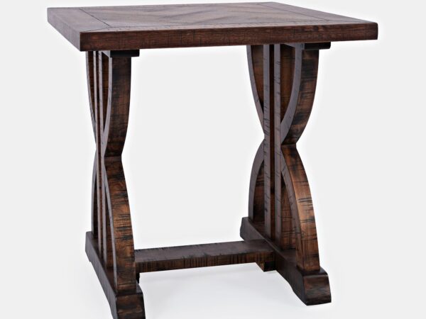 Kwadratowy stolik z ciemnego drewna z ozdobnymi nogami