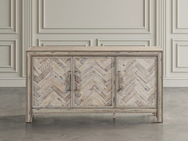 Komoda w stylu vintage z frontami w jodełkę i prostymi metalowymi uchwytami