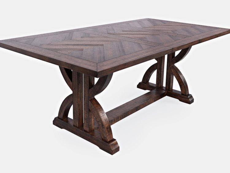 Prostokątny stół jadalniany z blatem w jodełkę i masywnymi nogami w kształcie krzyżaka w stylu rustykalnym z litego drewna