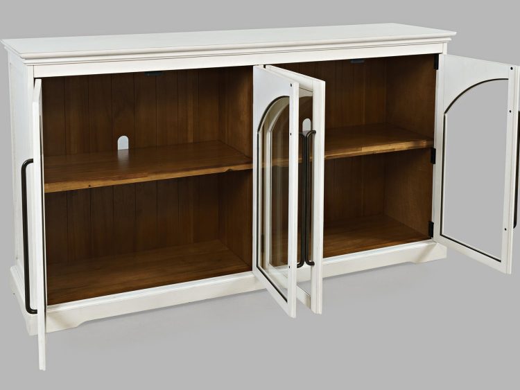 Biała komoda z otwartymi drzwiczkami i widoczną półką