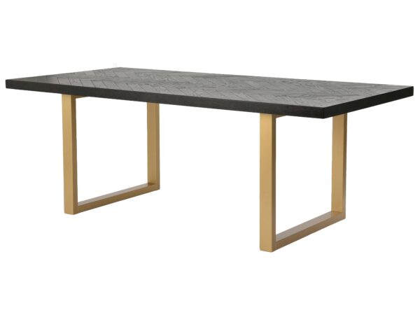 Stół prostokątny w stylu glamour z czarnym blatem w jodełkę i złotymi nogami