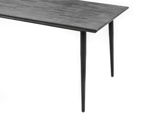 Nowoczesny stół prostokątny z czarnym blatem i smukłymi nogami