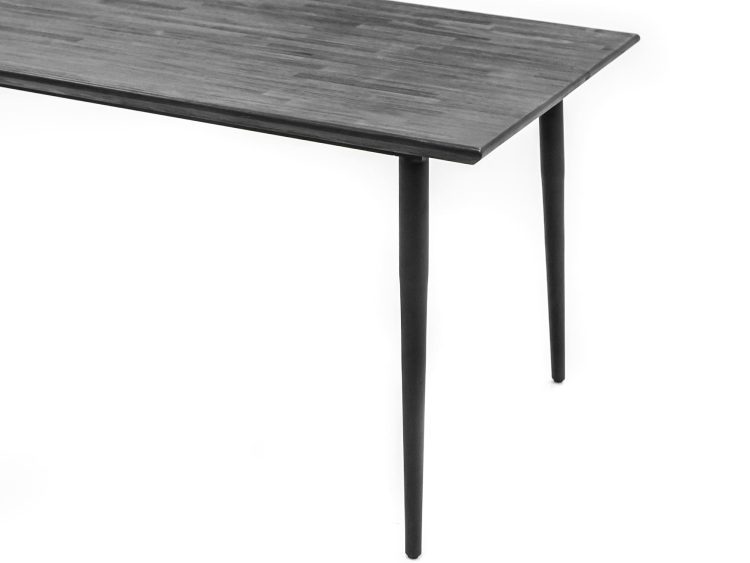 Nowoczesny stół prostokątny z czarnym blatem i smukłymi nogami
