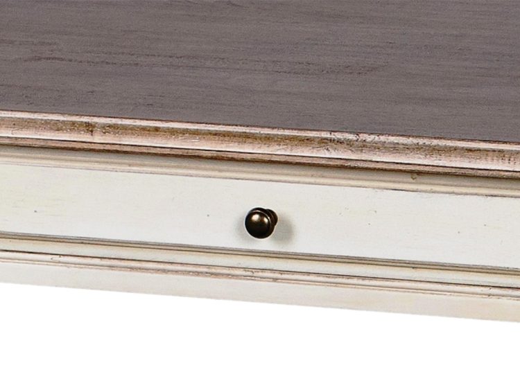 Zbliżenie na szufladę biurka z drewnianym frontem i okrągłym uchwytem