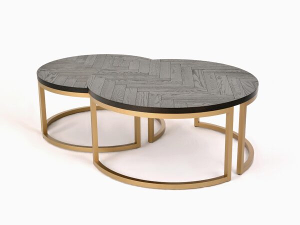 Zestaw dwóch stolików okrągłych w czarnym kolorze z blatem w jodełkę i złotą ramą