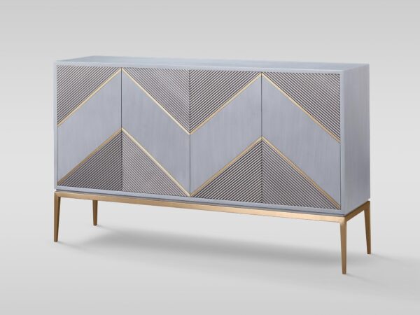 Komoda w kolorze jasnoniebieskim z geometrycznym wzorem i złotymi liniami, na smukłych nóżkach