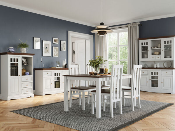 Stół okrągły orzechowy z białymi nogami w aranżacji